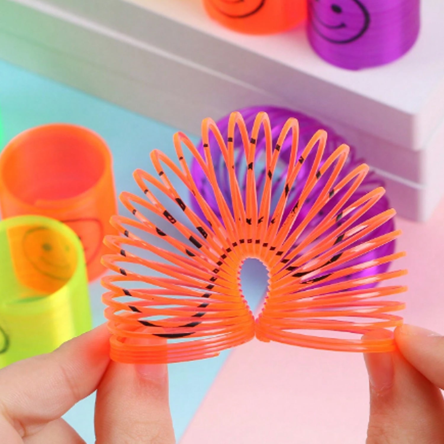 Multicolor Magic Smiley Spring, Spring Toys, Slinky, Slinky Spring Toy, Toy for Kids for Birthdays, Compact and Portable Easy to Carry (12 Pcs Set) - Bhavnagar Deodap