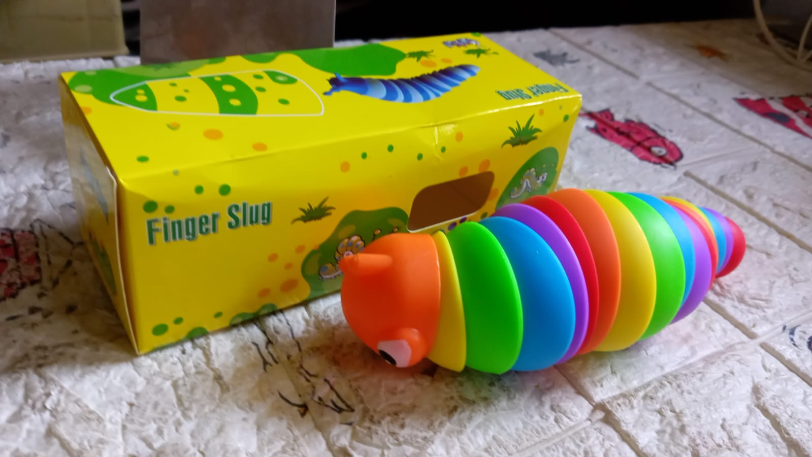 3D Rainbow Color Plastic Slug Fidget Toys, Stress Relieving Toy, Sensory Slug Toy for Boys and Girls, Finger slug Toy, for Autistic, Caterpillar Fidget Toys Stress Relief Gifts for Toddlers Kids Adults  (1 Pc) - Bhavnagar Deodap